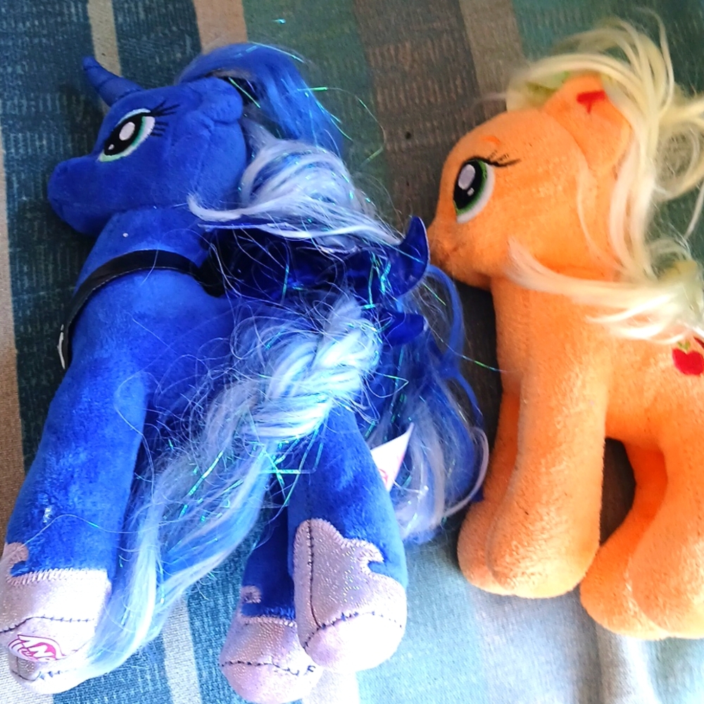 Ty beanies Princess Luna and Apple Jack. Apple Jack no longer available.
